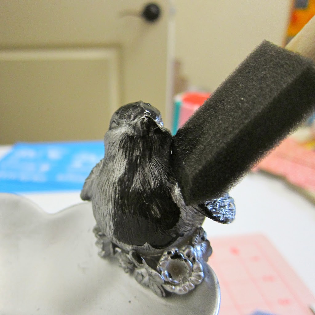 dry brush black paint onto silver bird