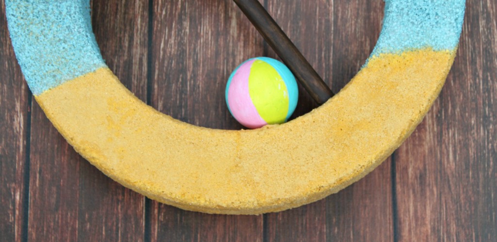 Make a beach themed wreath that is colorful and easy to make.
