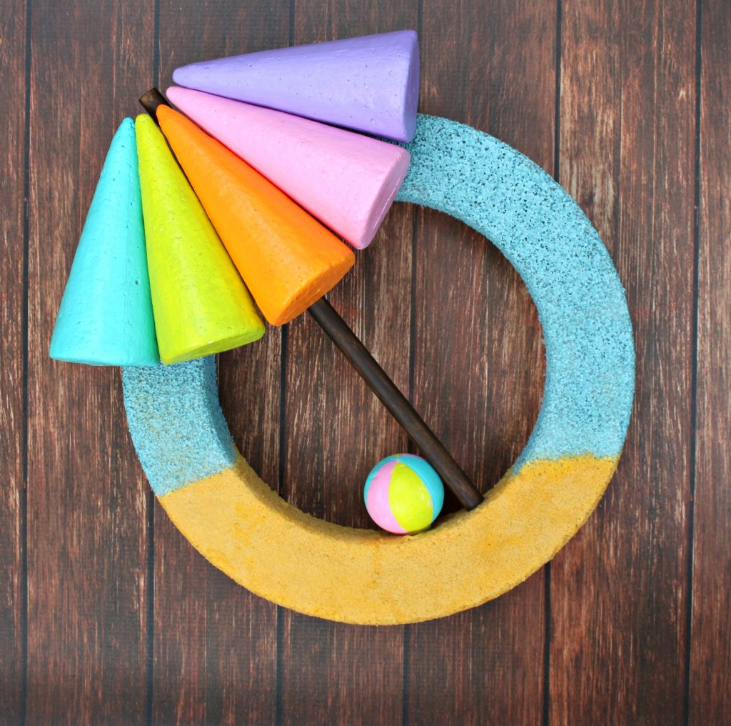 Make a beach themed wreath that is colorful and easy to make.