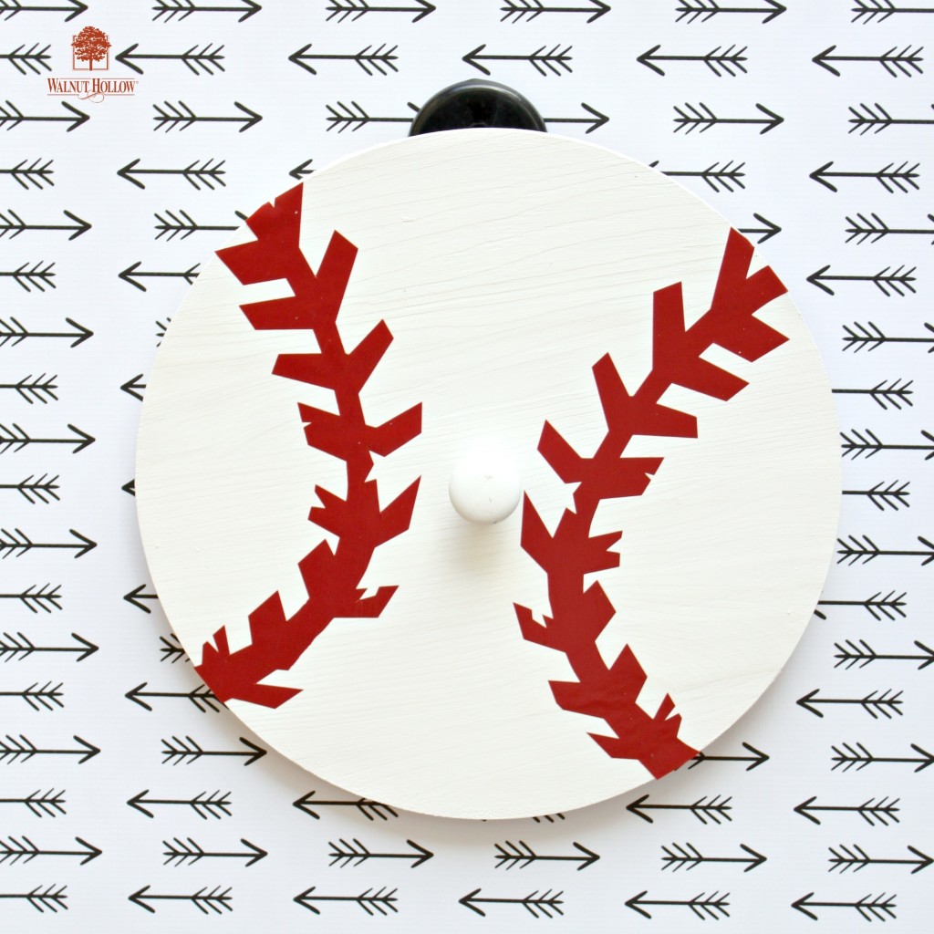 Turn unfinished wood pieces into sporty wall hooks to organize your stuff.
