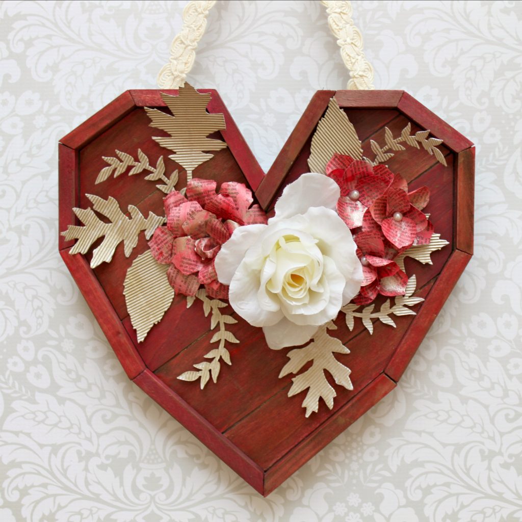 Turn a pallet heart into a beautiful shabby chic piece of wall art.  Learn how to create a paint wash to make this mixed media piece.