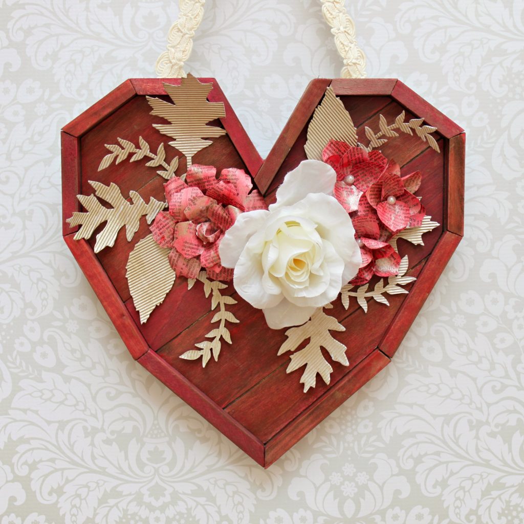 Turn a pallet heart into a beautiful shabby chic piece of wall art.  Learn how to create a paint wash to make this mixed media piece.