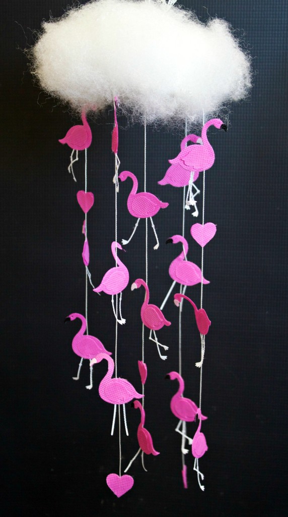 Create a fun flamingo mobile for your home or party this summer! Die cuts and non fraying fabric make this a quick, easy project.