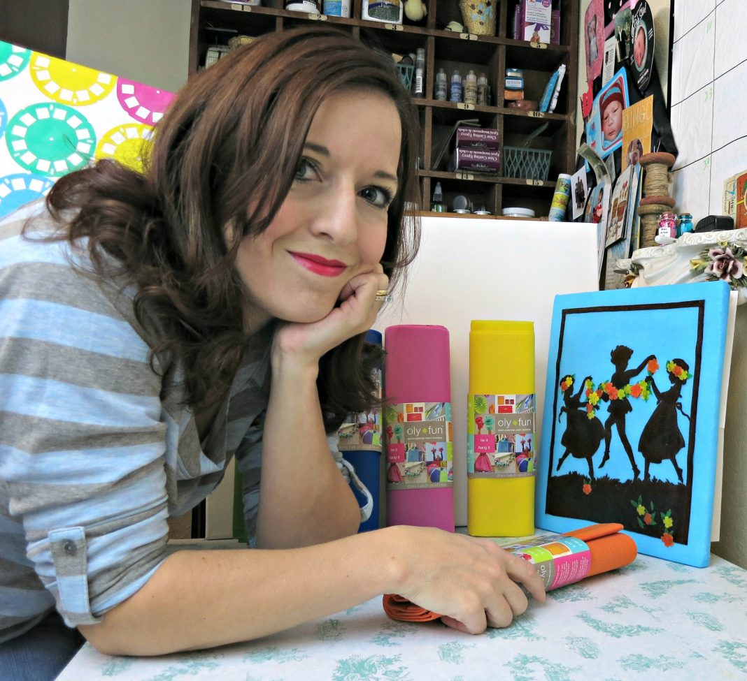 Create detailed silhouette wall art by using non fraying fabric and foam boards.