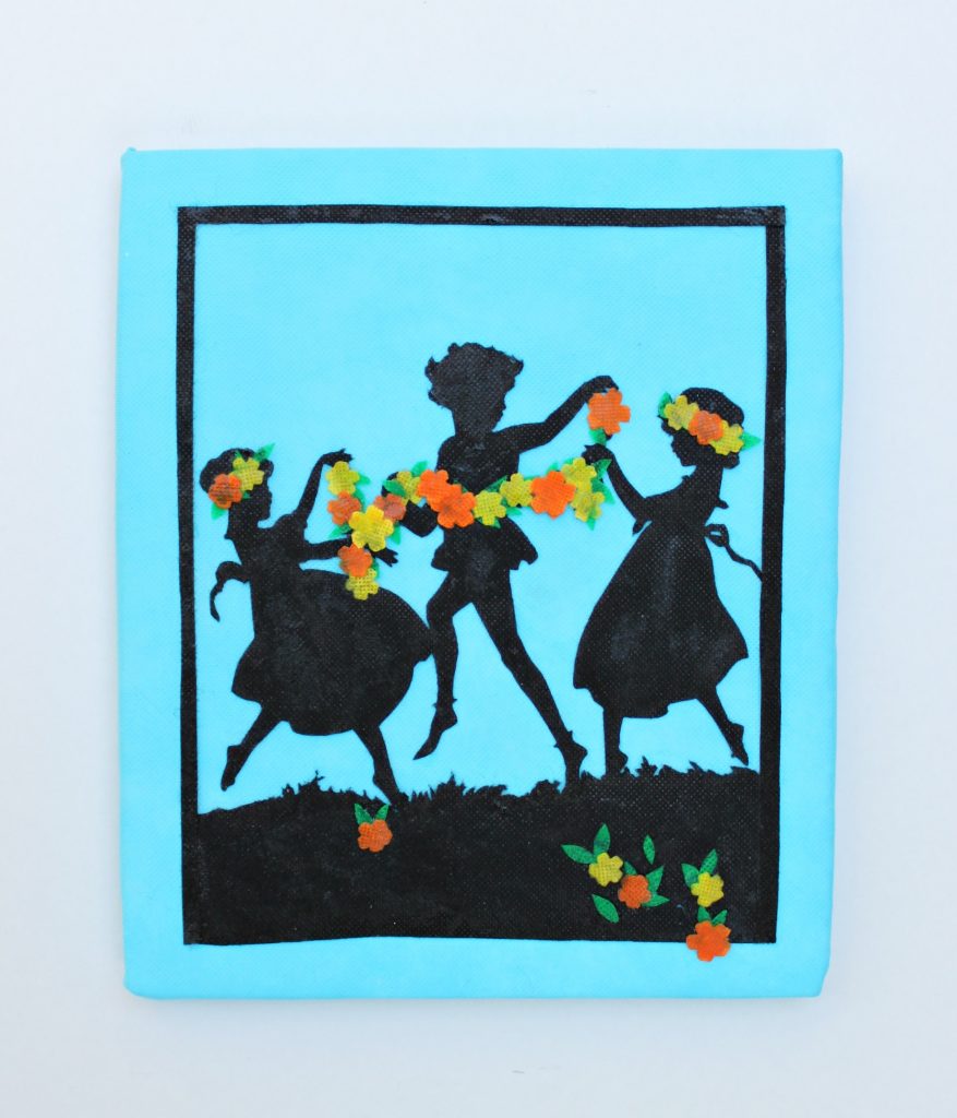 Create detailed silhouette wall art by using non fraying fabric and foam boards.