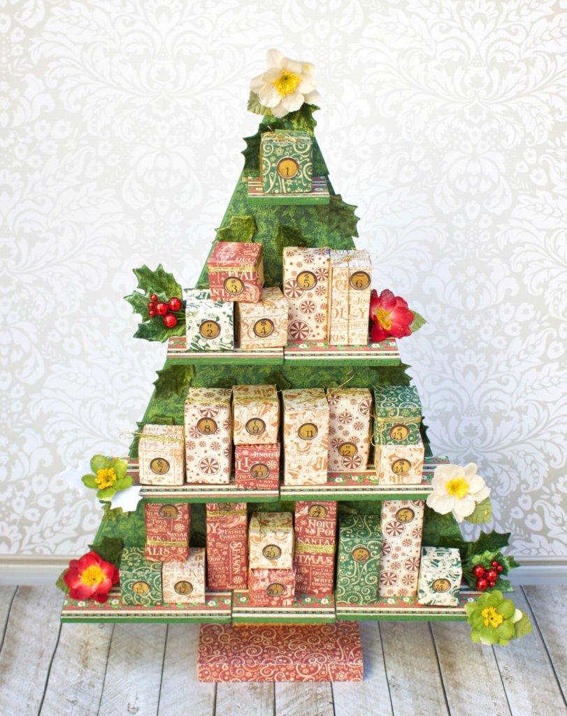 Create a festive Christmas tree countdown calendar using products from Graphic 45, Petaloo, and Xyron. Great home decor craft project!