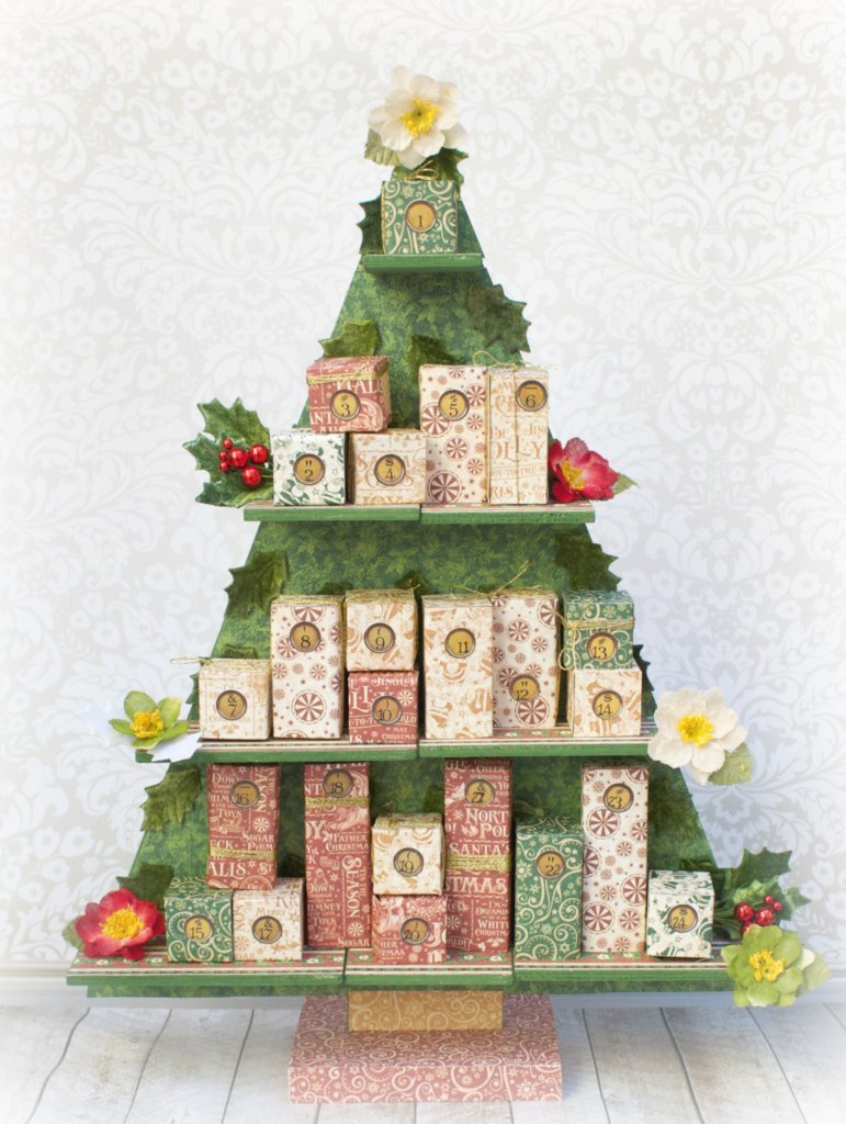 Create a festive Christmas tree countdown calendar using products from Graphic 45, Petaloo, and Xyron. Great home decor craft project!