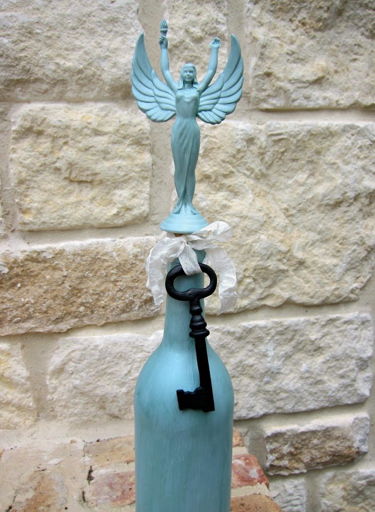 Make a trophy bottle stopper by upcycling thrifted items from Goodwill! Create beautiful home decor for pennies with recycled goods.