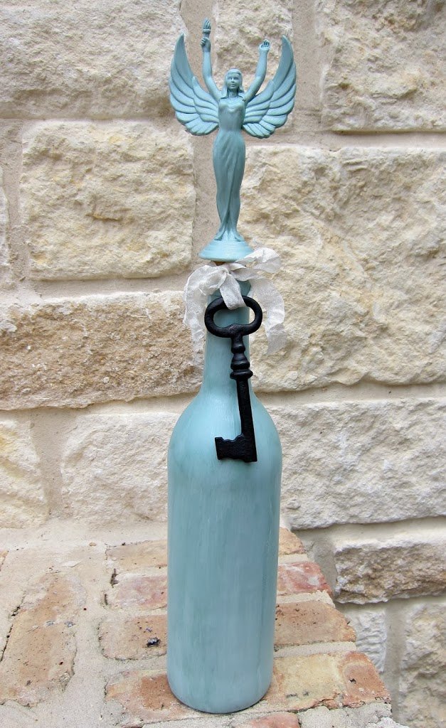 Make a trophy bottle stopper by upcycling thrifted items from Goodwill! Create beautiful home decor for pennies with recycled goods.
