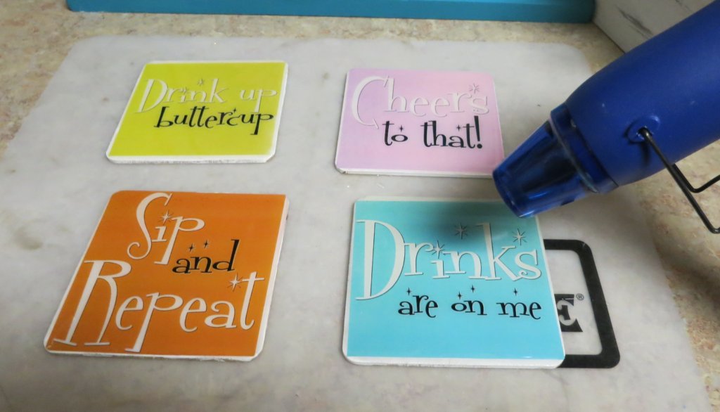 Make funny coasters that will last by using weather proof printable labels, a free printable, and resin. Complete tutorial.