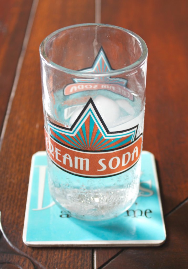 Make funny coasters that will last by using weather proof printable labels, a free printable, and resin. Complete tutorial.