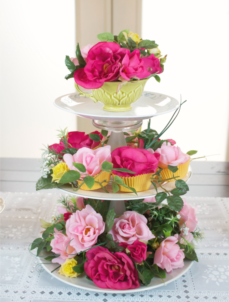 This floral centerpiece is made with thrifted items from Goodwill San Antonio, but looks high end!  Add whimsy to your tea party or garden party with this fun project.