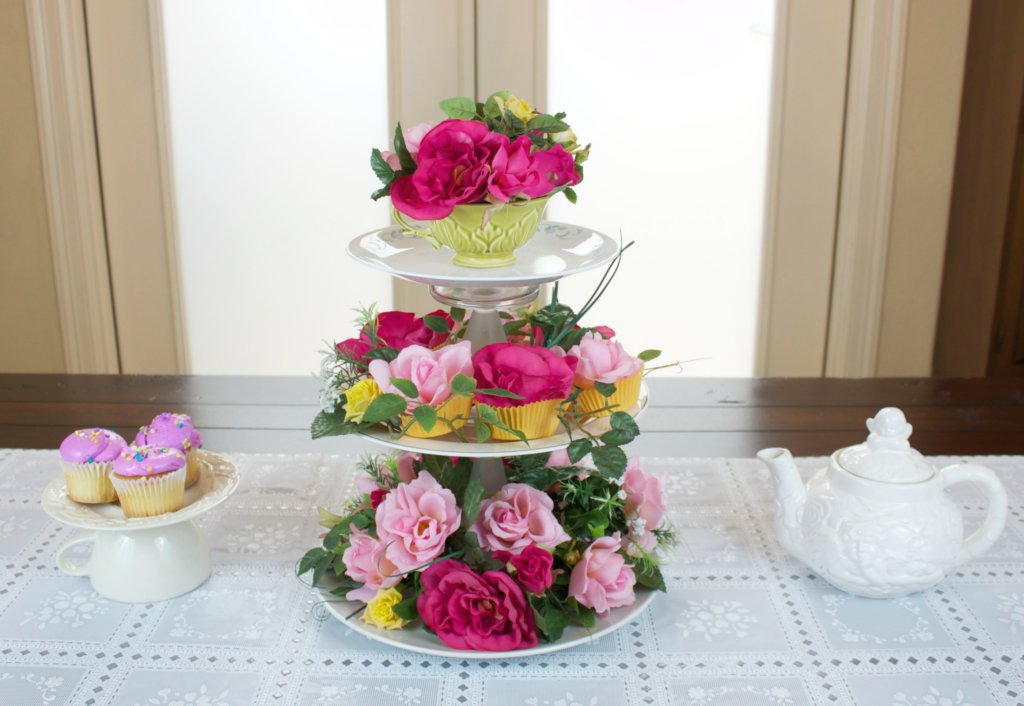 This floral centerpiece is made with thrifted items from Goodwill San Antonio, but looks high end!  Add whimsy to your tea party or garden party with this fun project.