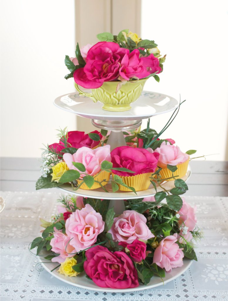 This floral centerpiece is made with thrifted items from Goodwill San Antonio, but looks high end!  Add whimsy to your tea party or garden party with this fun project.