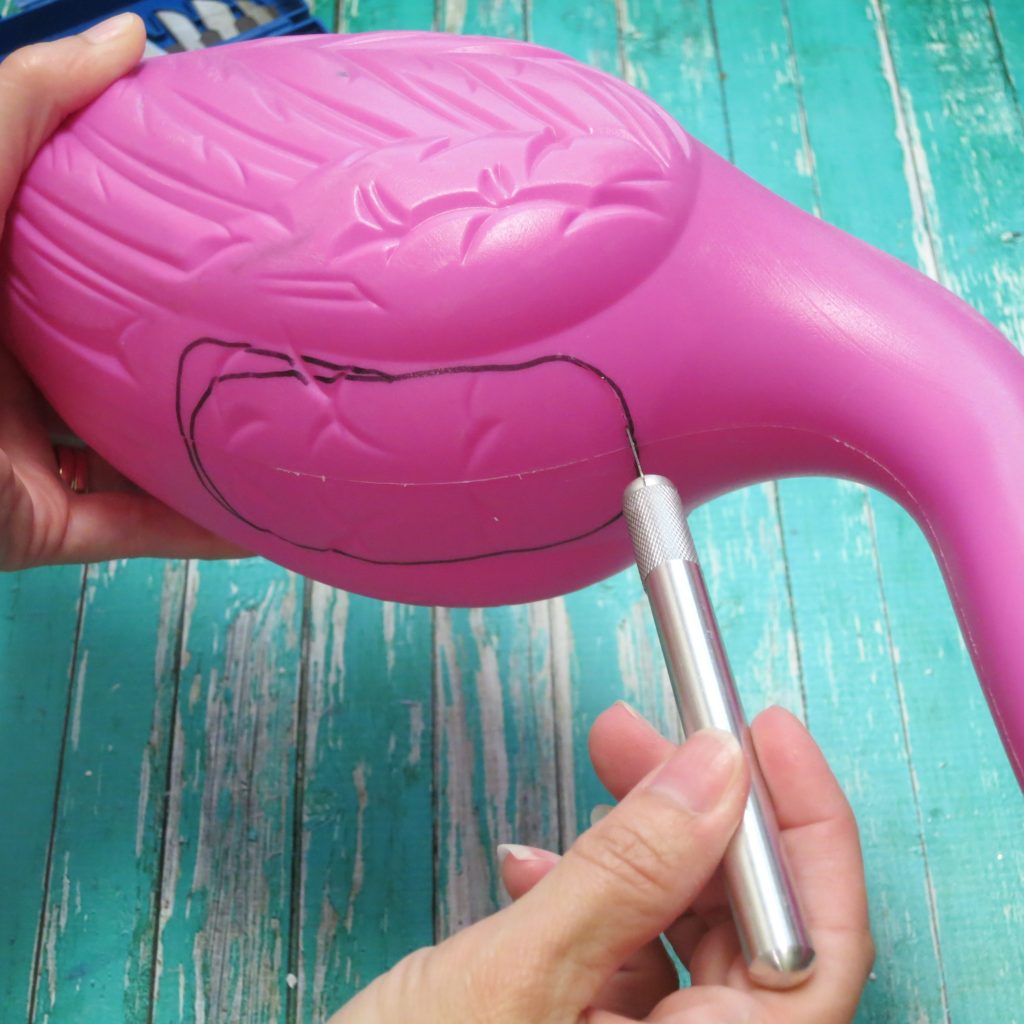 Let me show you how simple it is to turn plastic pink flamingoes into faux metallic flamingo planters for your home.