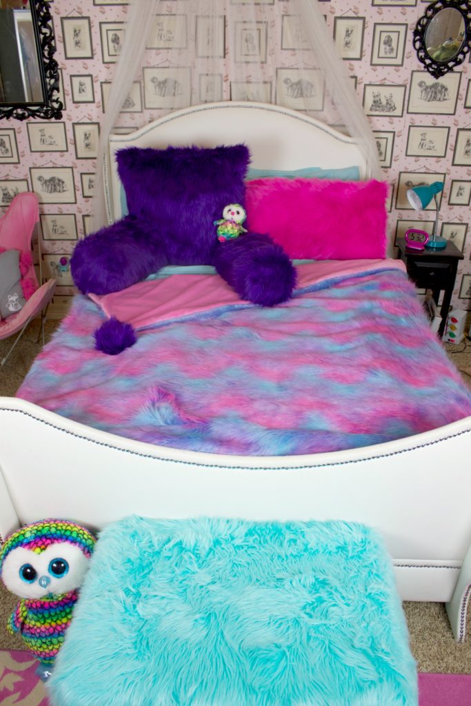 Transform an outdated ottoman from Goodwill San Antonio into a fun piece of dorm decor in under one hour! This ottoman slipcover DIY is Easy to make.