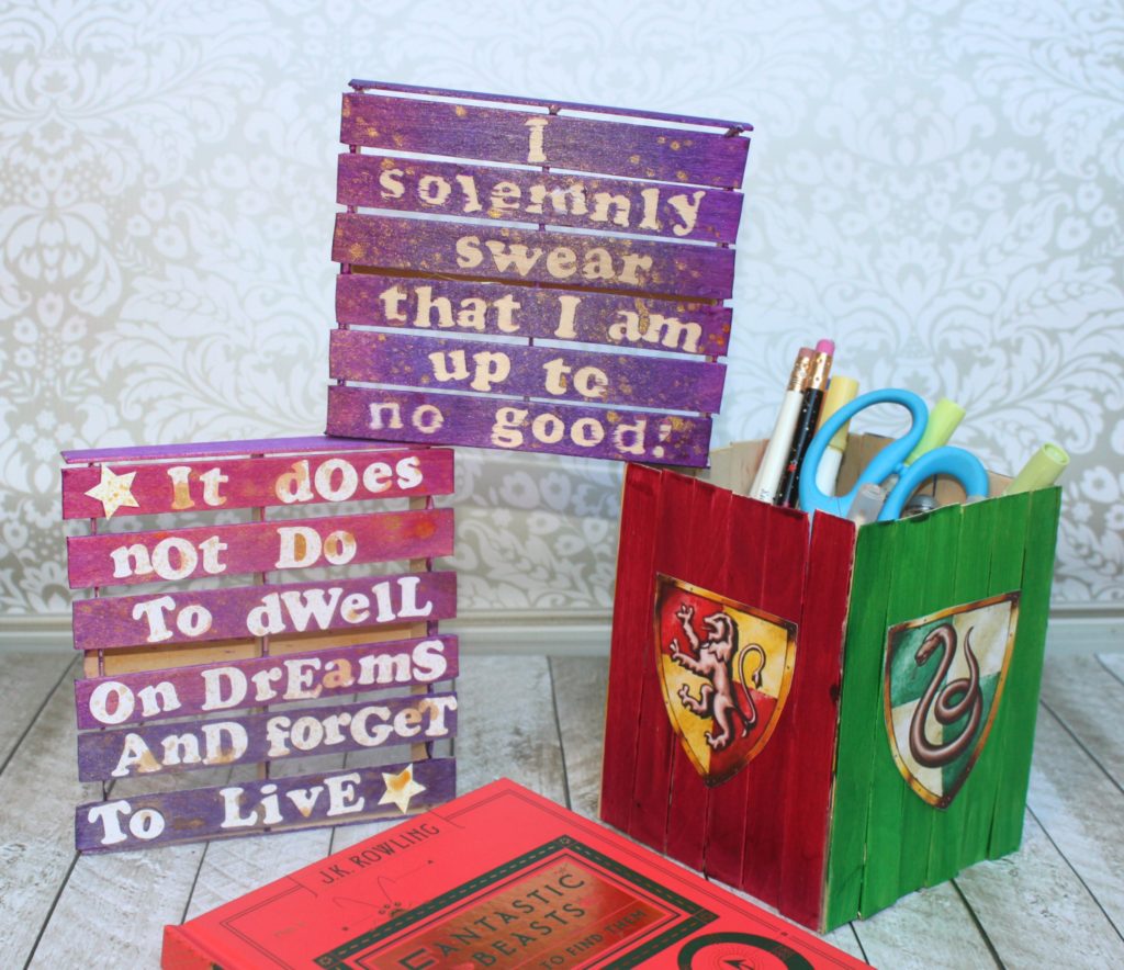 I made some mini pallet Potter inspired wall art as well as a pencil holder out of craft sticks.  This makes perfect desk decor!