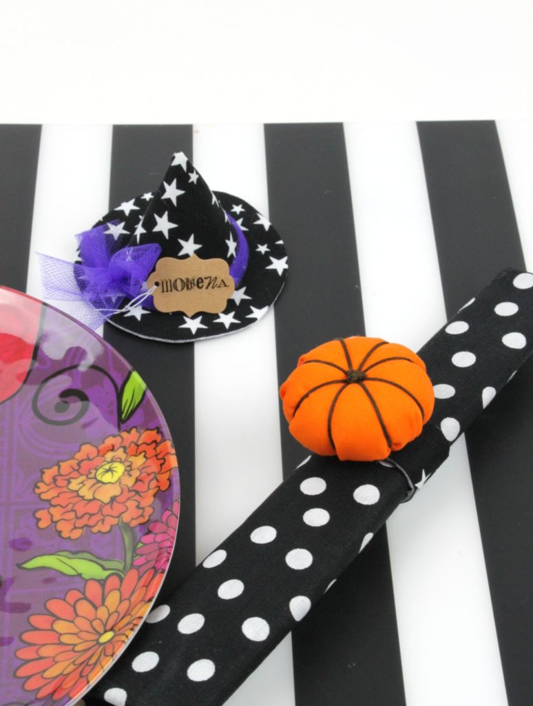 Learn how to add some fun Halloween and fall table decor to your place setting!