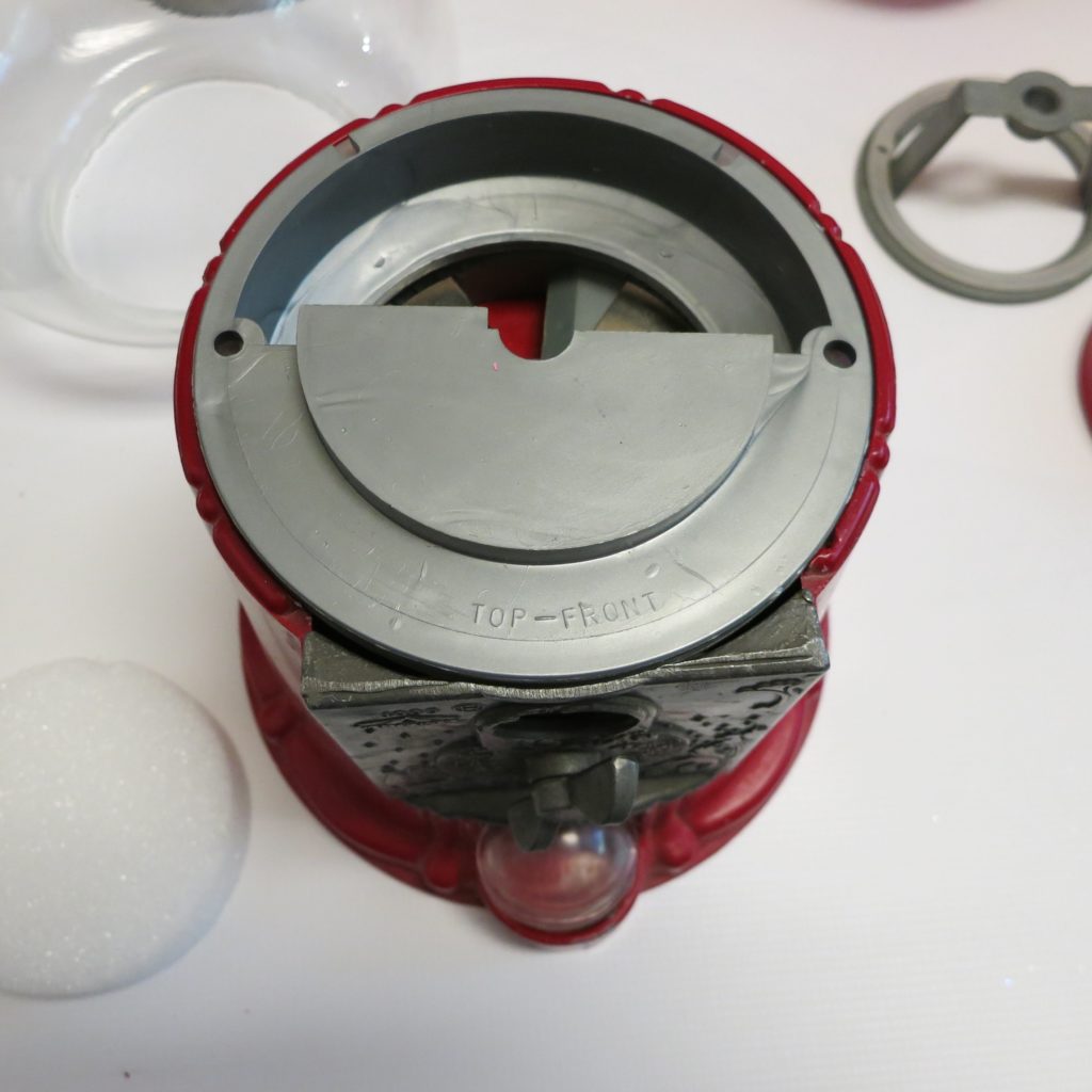 Make a gumball machine snow globe using a thrift store item with various craft supplies. Make adorable holiday Christmas and winter decor!