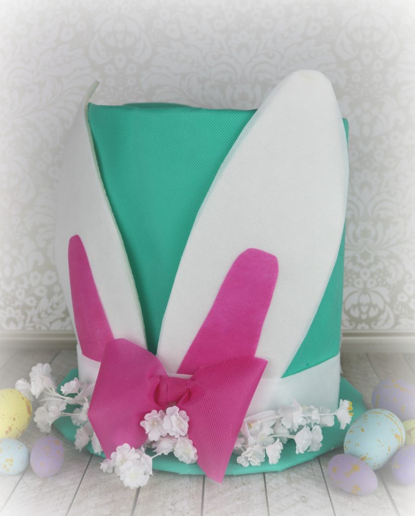 Welcome spring with this colorful and oversized piece of Easter decor! This extra large Easter Bunny Hat makes a great centerpiece or piece of home decor.