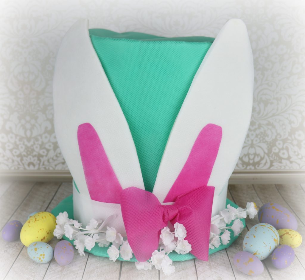Welcome spring with this colorful and oversized piece of Easter decor! This extra large Easter Bunny Hat makes a great centerpiece or piece of home decor.