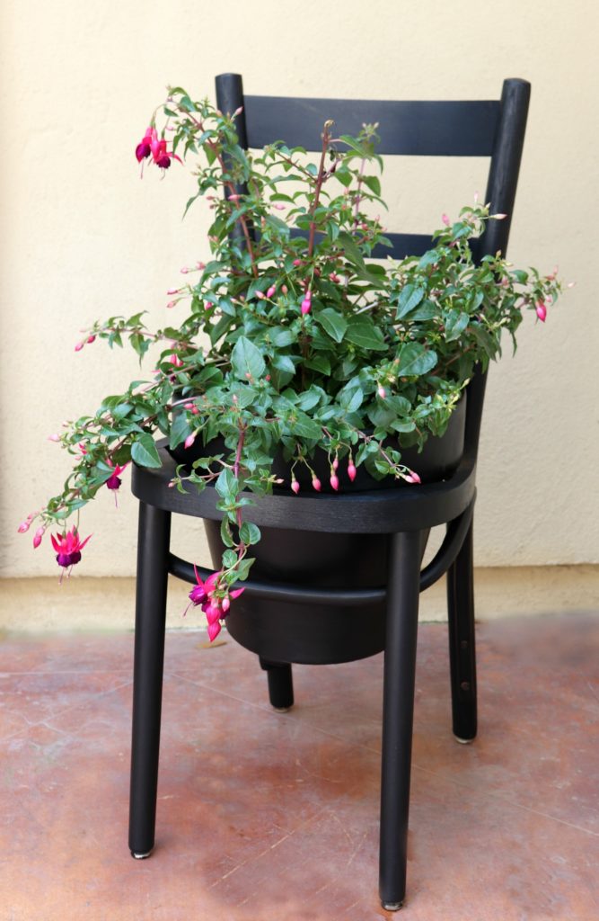 Make a terra cotta pot chair planter in a jiffy.
