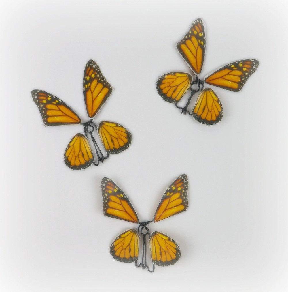 Make a butterfly fidget spinner DIY using a free printable, OnlineLabels.com sticker sheets, and craft wire. This spinning craft is mesmerizing!