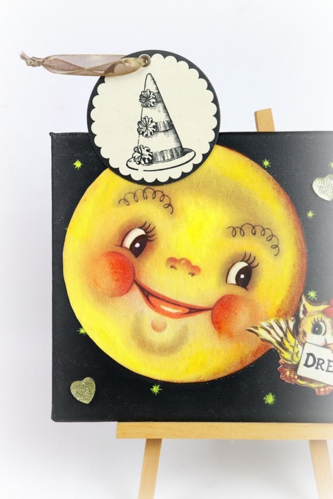 Make a mixed media owl and moon wall art to encourage little ones to "dream big". This cute piece of decor is easier to make than you realize!