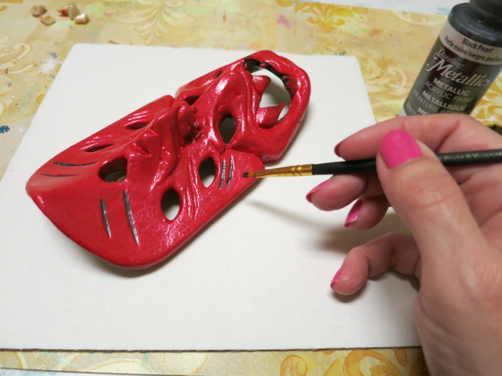 This handsome devil creepy craft is a silly twist on a Goodwill thrift store find. Make this as a weird Valentine or for Halloween.