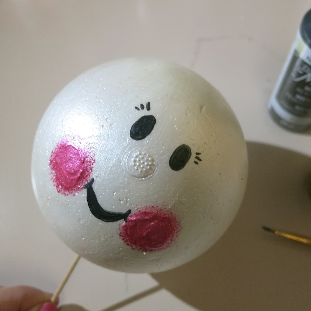 add details to the snowman face