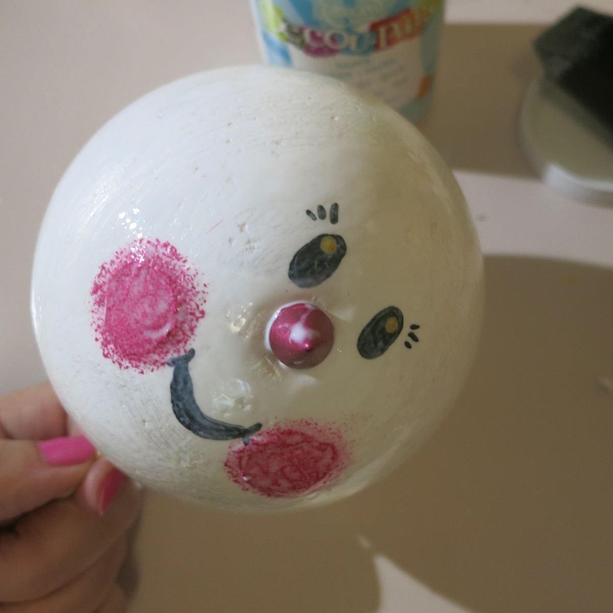 add the snowman nose