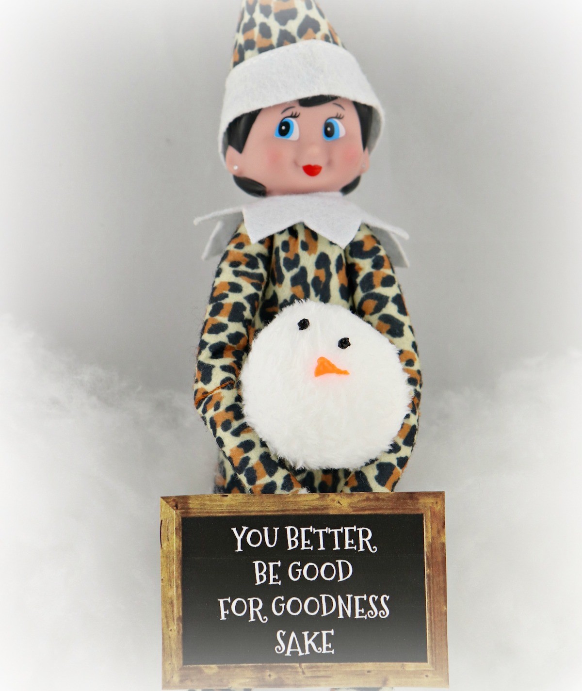 elf on shelf with snowman head