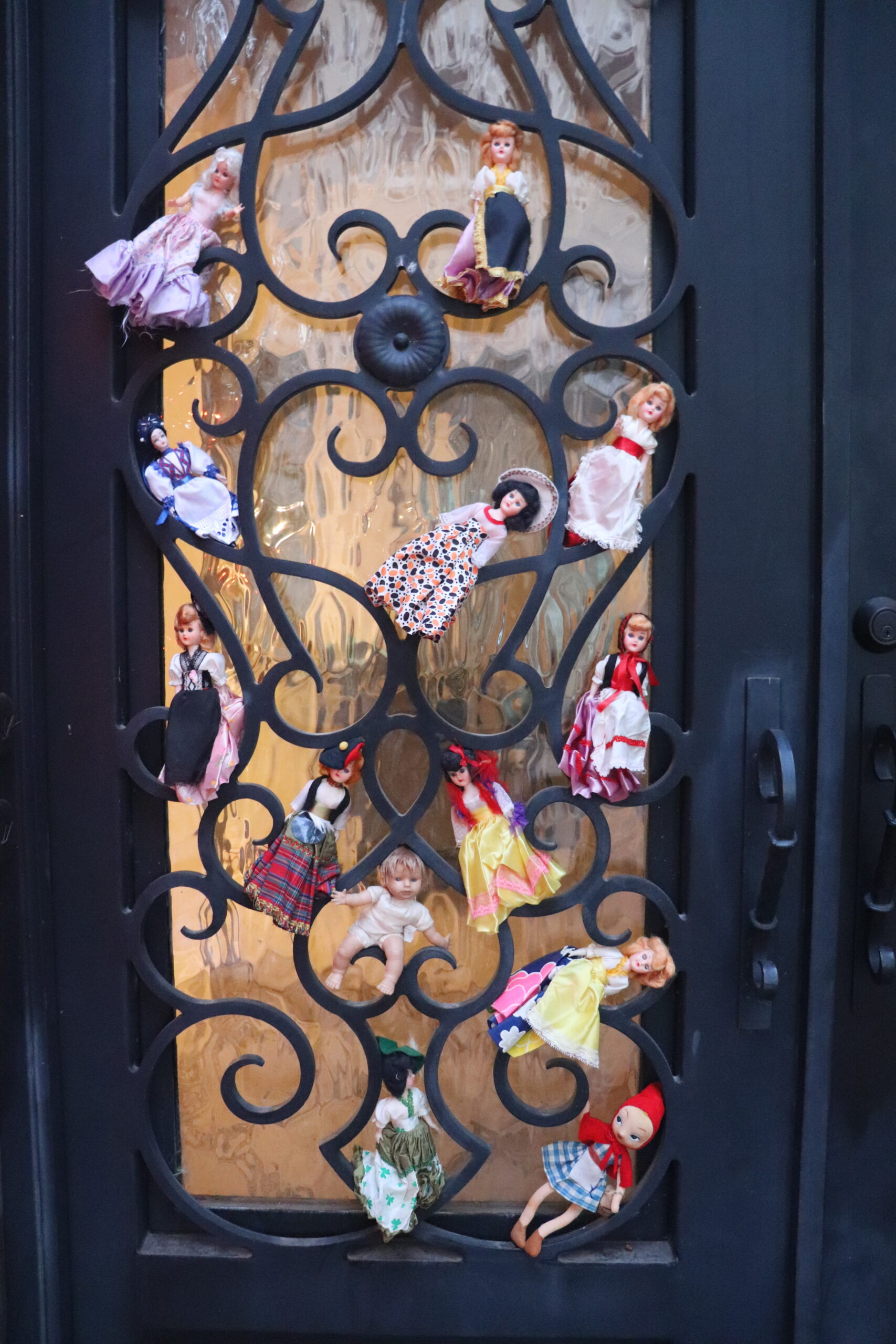 dolls on door