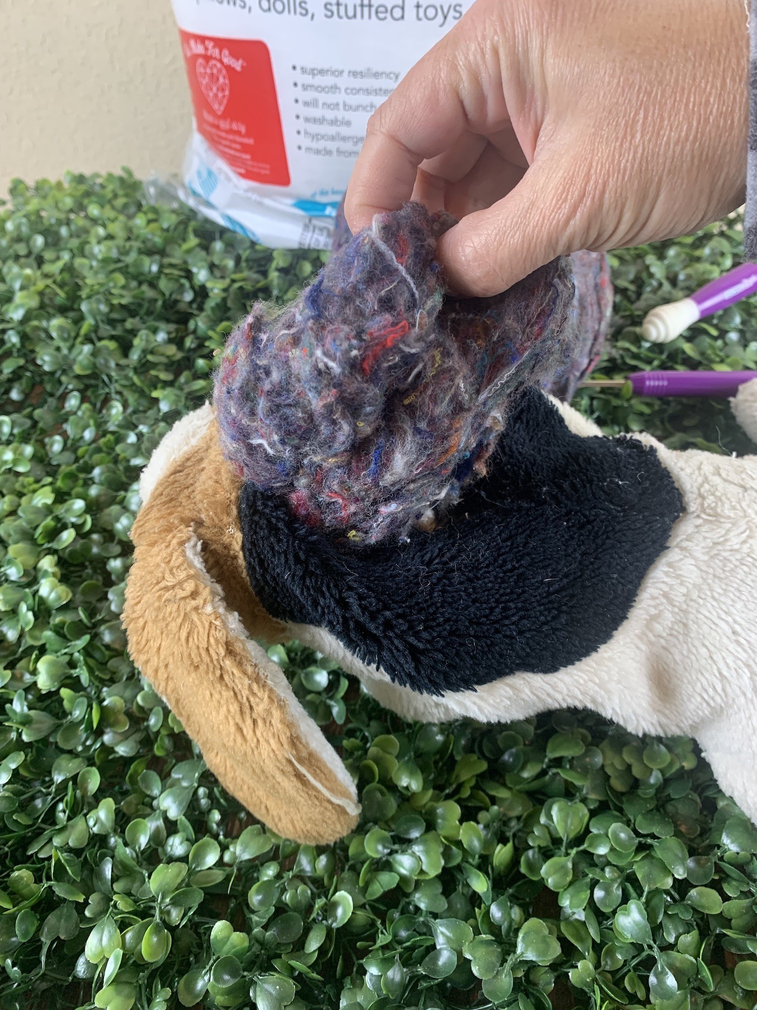 remove old stuffing from toy