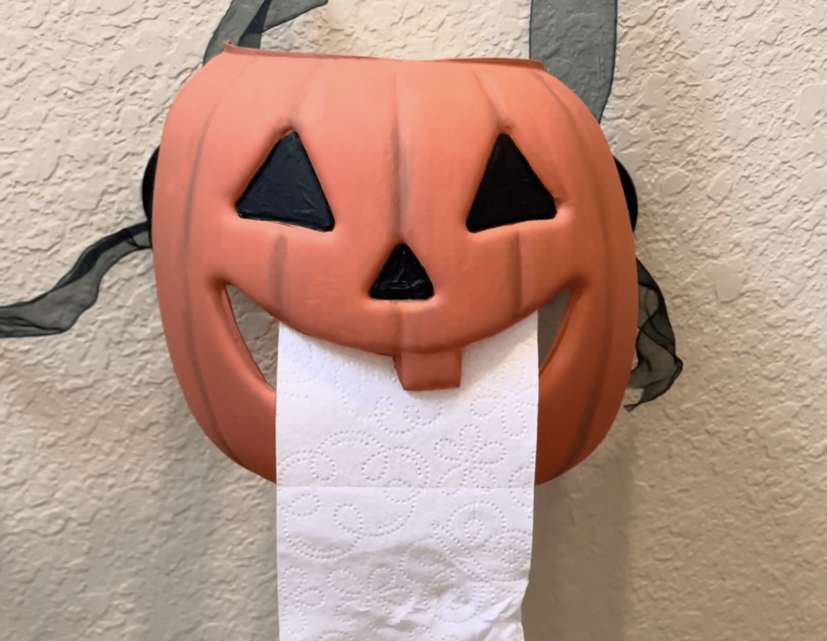 DIY Pumpkin Pail Toilet Paper Holder
